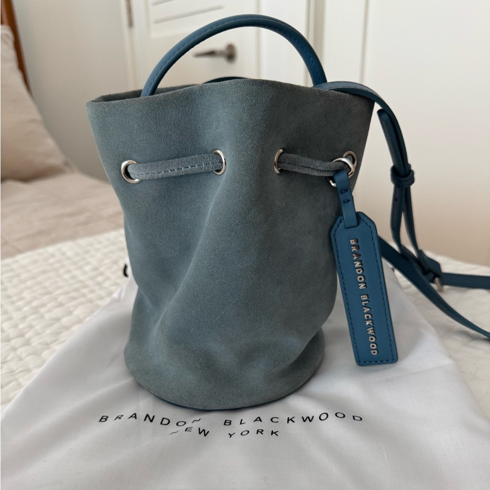 Brandon Blackwood blue suede kamal bucket bag